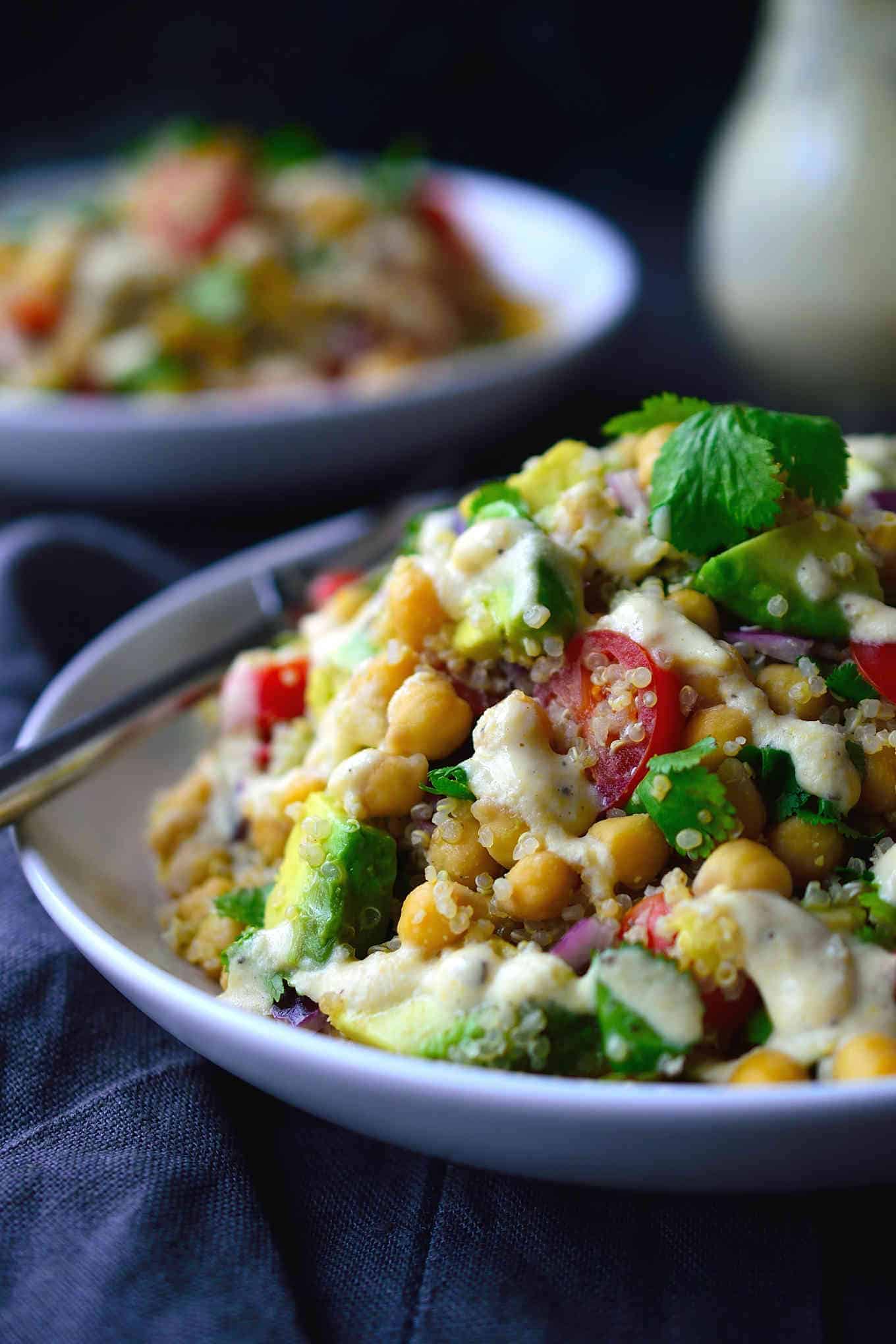 This chickpea avocado salad is super easy to make and great for a weekday lunch, side dish or to take to a potluck, picnic or BBQ. You can choose to serve this salad as-is with a squeeze of lemon juice, or whip up a creamy vegan dressing to drizzle over top. Either way it’s a hearty, protein-packed and delicious salad that will keep you full for hours!