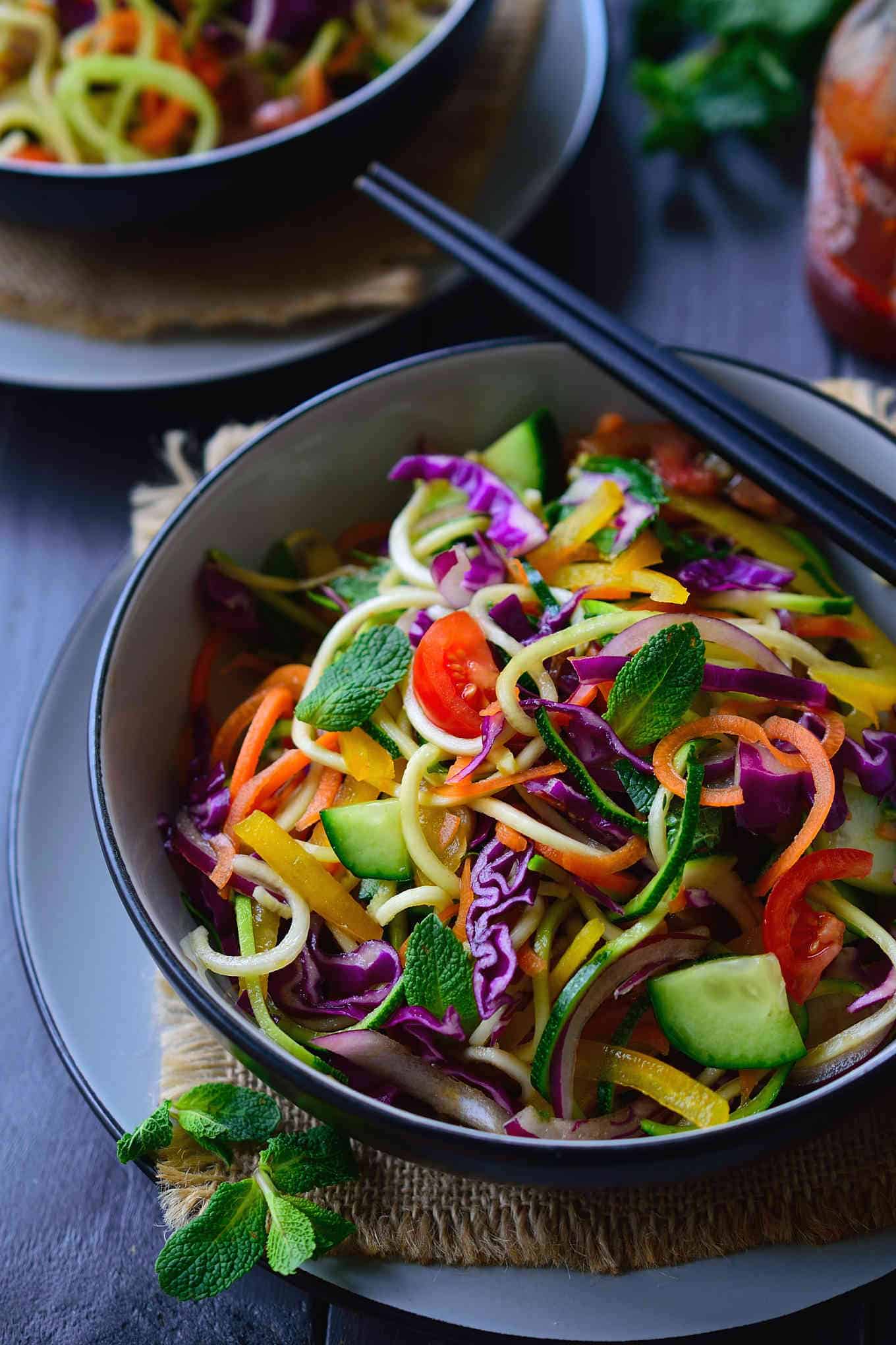 This raw vegan noodles salad recipe is super quick and easy to put together and is great served as a main or side dish. All you need is a selection of colourful vegetables, some pantry staples and a spiralizer.