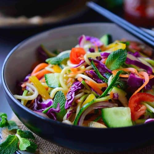 This raw vegan noodles salad recipe is super quick and easy to put together and is great served as a main or side dish. All you need is a selection of colourful vegetables, some pantry staples and a spiralizer.