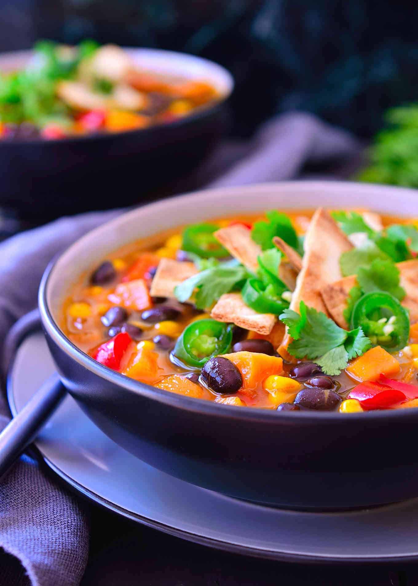 This vegetarian enchilada soup tastes just like ... you guessed it: enchiladas, but in soup form. Not only is it super tasty, it’s much quicker and easier than traditional enchiladas as it can be ready in just 20 minutes! It’s a super lazy, freezer friendly and filling meal that costs less than two dollars a serving.
