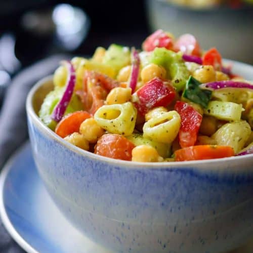 This vegan avocado pasta salad is a quick 15-minute recipe that can be prepped ahead and great to take along to a picnic, barbecue, potluck or as an easy weeknight dinner. This no-mayo pasta salad is deliciously creamy and packed full of fresh veggies.