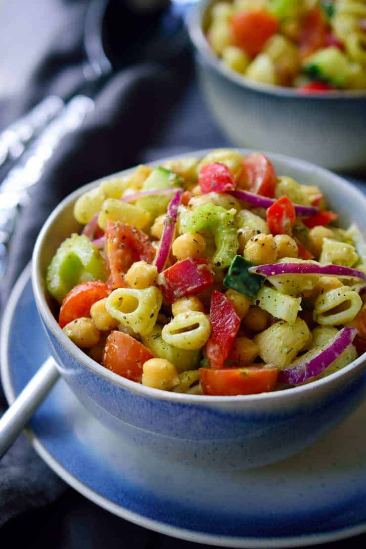 Vegan avocado pasta salad is a quick 15-minute recipe that can be prepped ahead and great to take along to a picnic, barbecue, potluck or as an easy weeknight dinner.