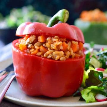 Vegan stuffed peppers are an all-time family favourite. They’re easy to make, adaptable to whatever you have on hand and can be made ahead for a quick dinner with minimal prep. With a cheap filling of rice, mushrooms and carrots, these stuffed peppers are perfect for a filling meal on a budget.