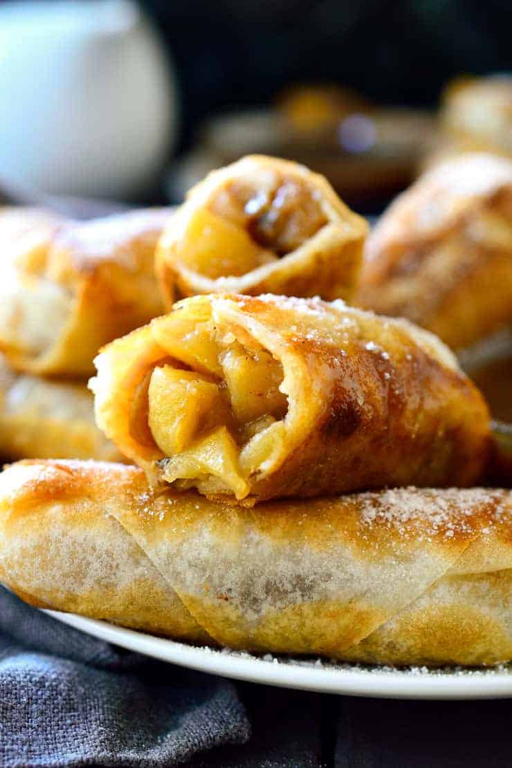 This recipe for vegan apple pie egg rolls is an easy dessert for vegans with a sweet tooth. A simple apple-cinnamon filling wrapped inside spring roll wrappers and served with an addictive two-ingredient vegan caramel sauce. Great for an occasional sweet treat!