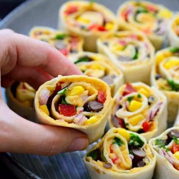 These Mexican tortilla roll ups are vegan and make a great easy snack or appetizer. They’re super quick to make and perfect to throw together before having guests over.