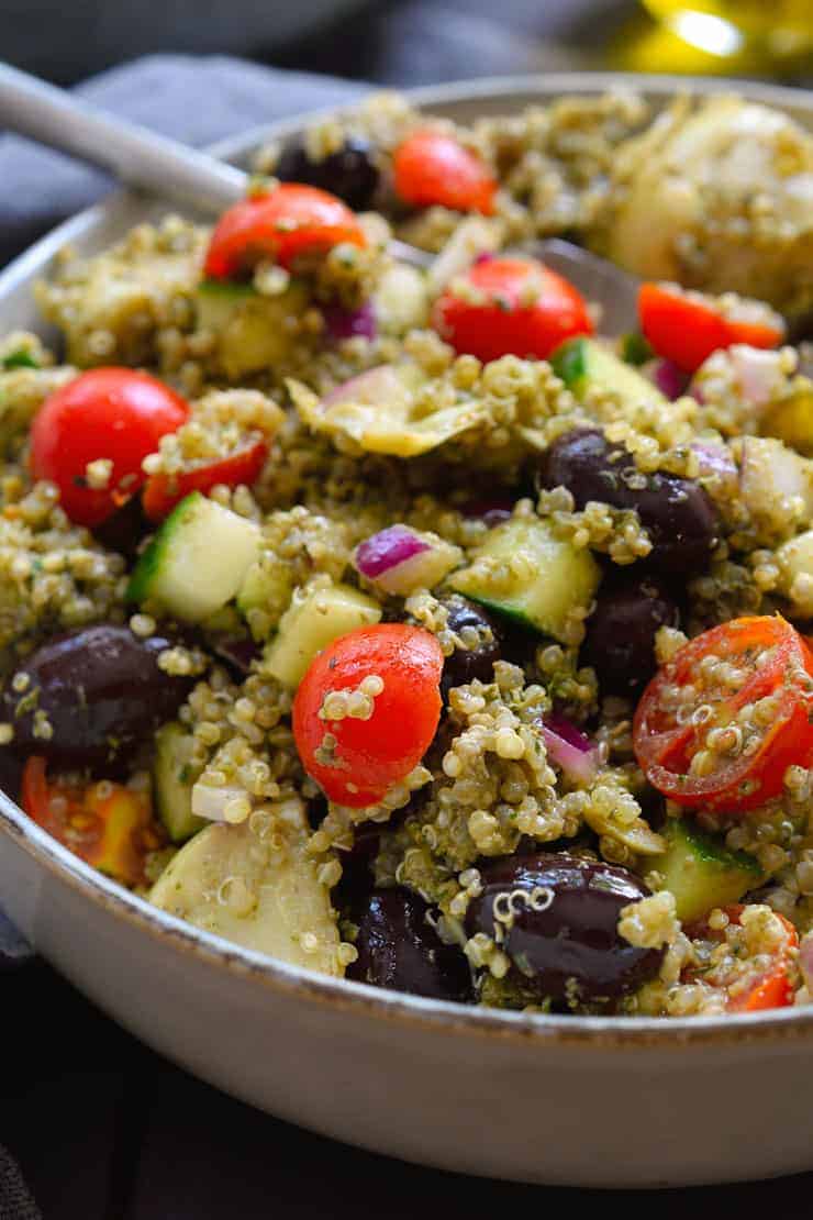 This pesto quinoa salad is quick and easy to make, packed with flavour and a rainbow of Mediterranean veggies. The perfect weeknight dinner when you don’t feel like cooking or a great picnic, potluck or barbecue side dish!