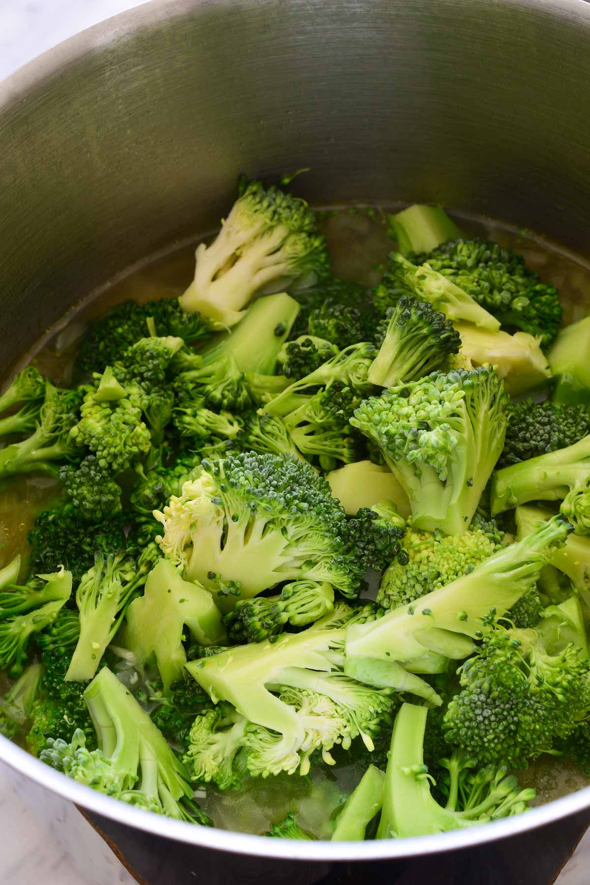 The broccoli florets in the pot.