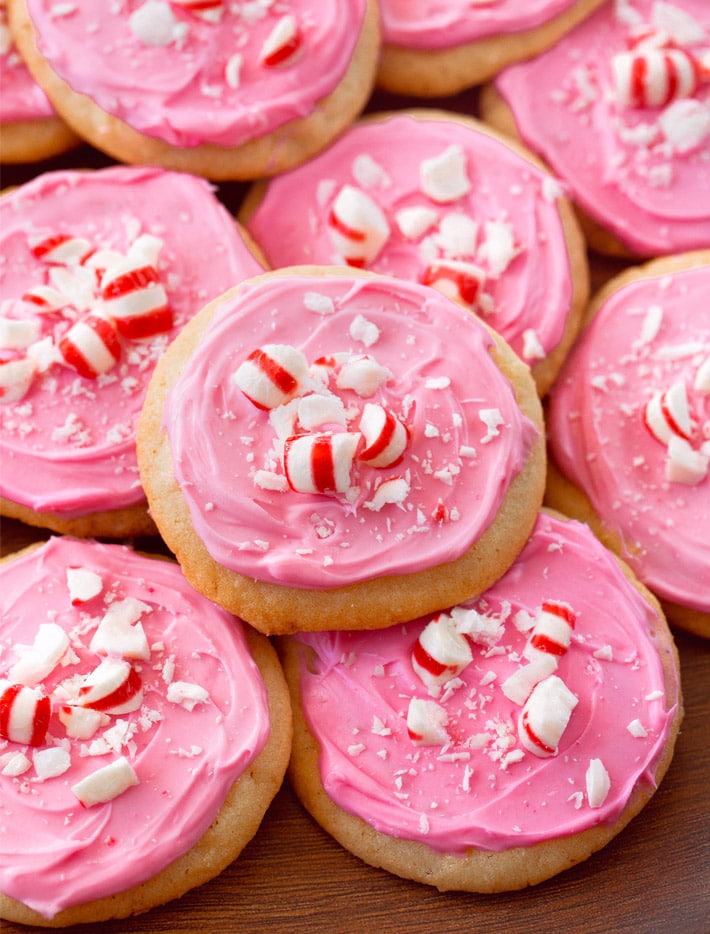 Pink peppermint cookies with crushed candy canes on top.