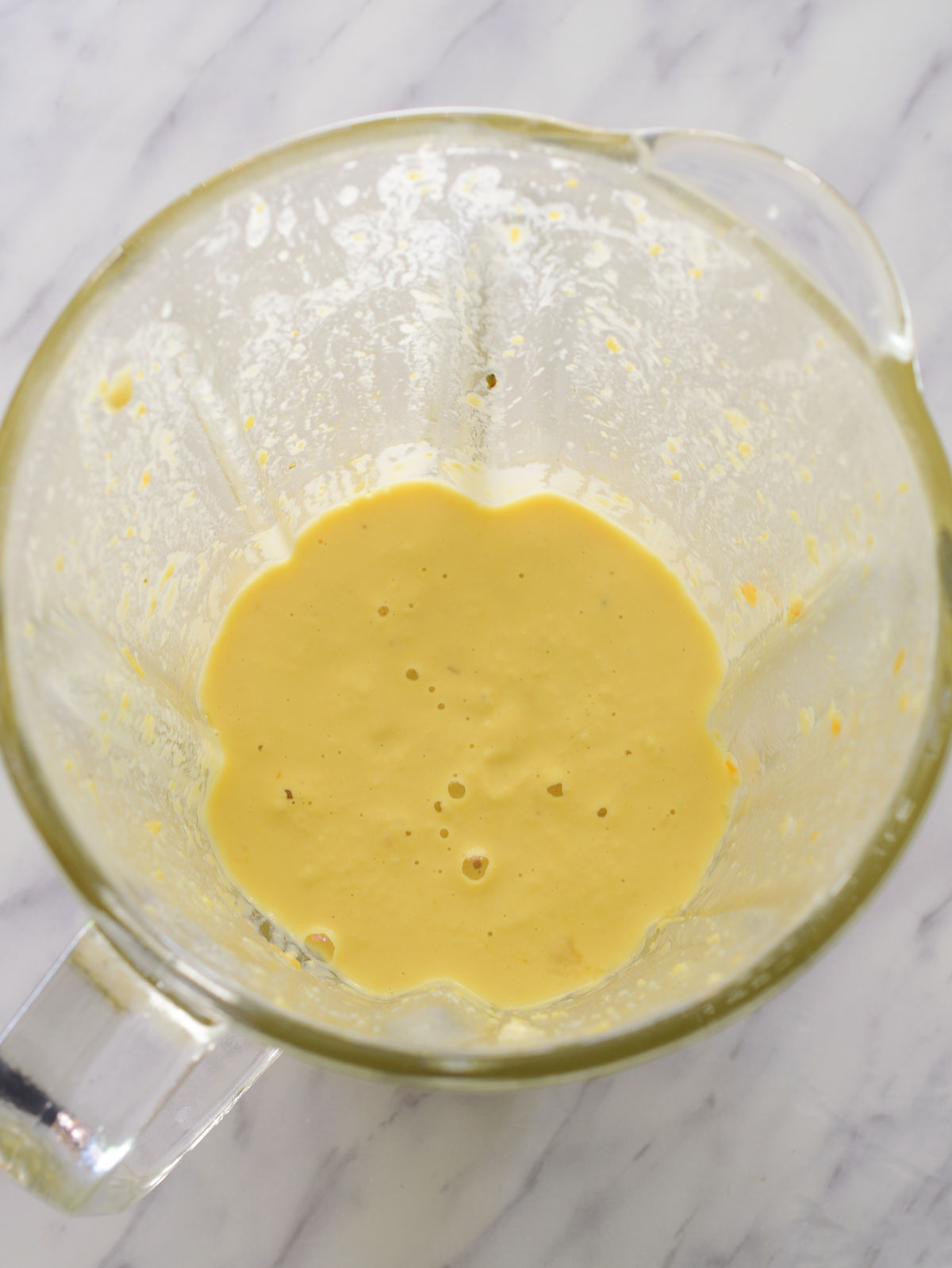 The blended chickpeas inside the blender cup.